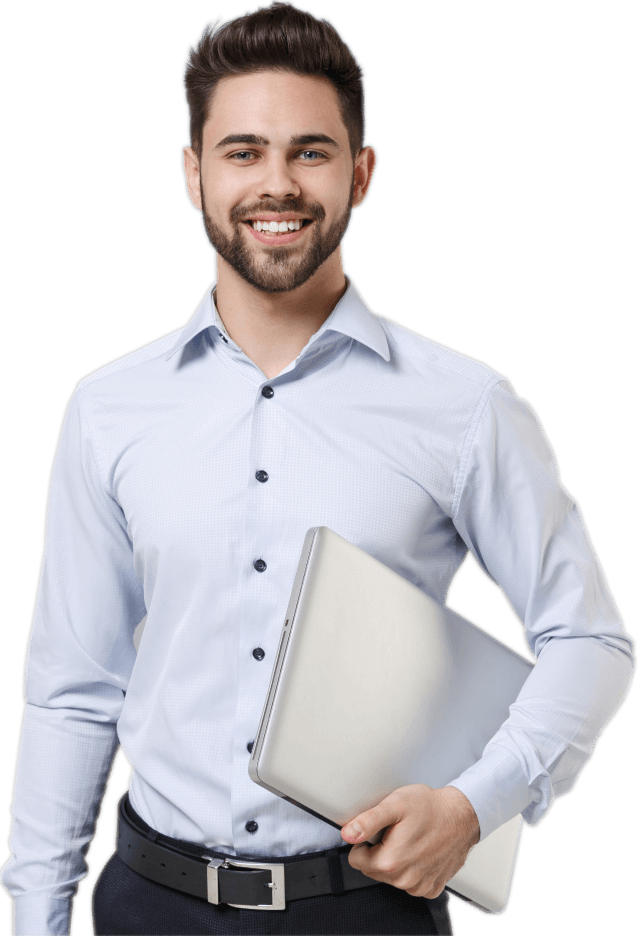 Smiling young man in a dress shirt holding a laptop